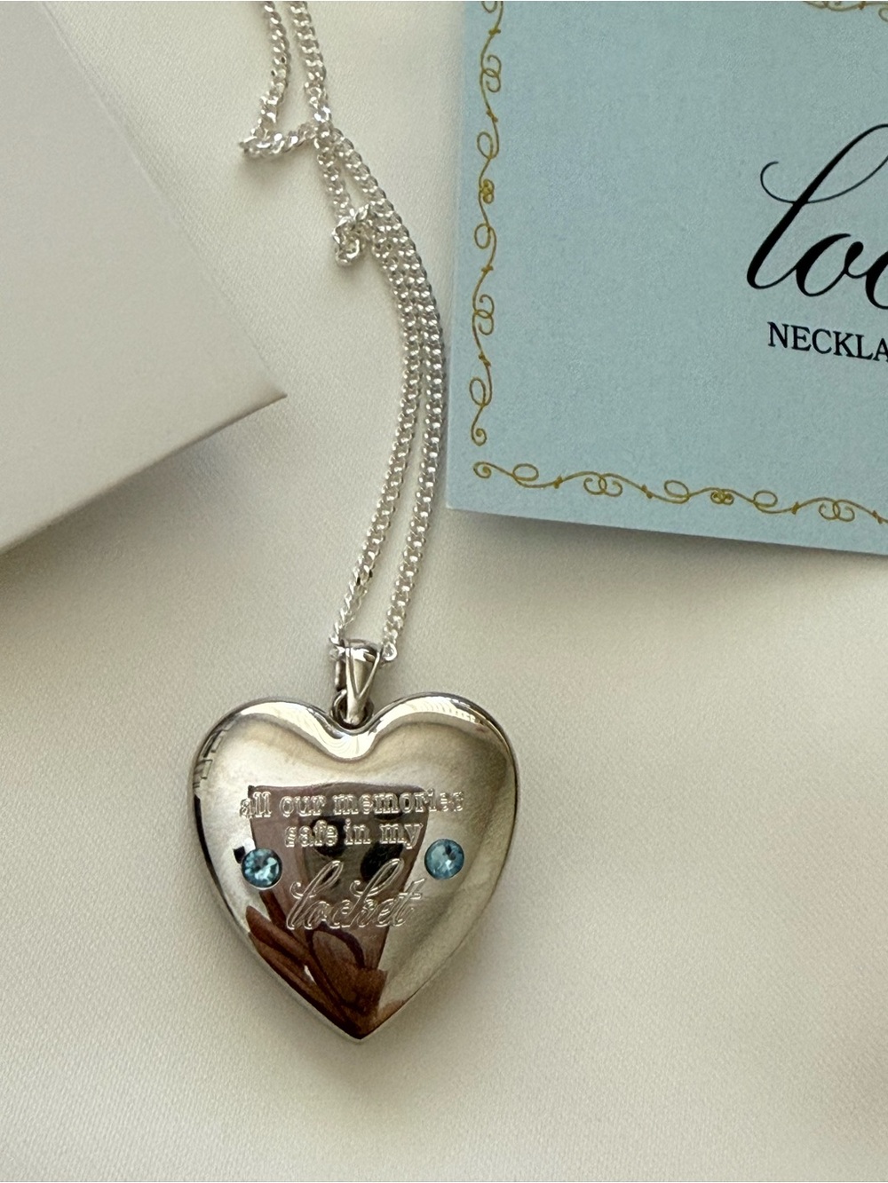 Madison Beer Silver Heart Locket Necklace with Blue Accents - Picture 5 of 6